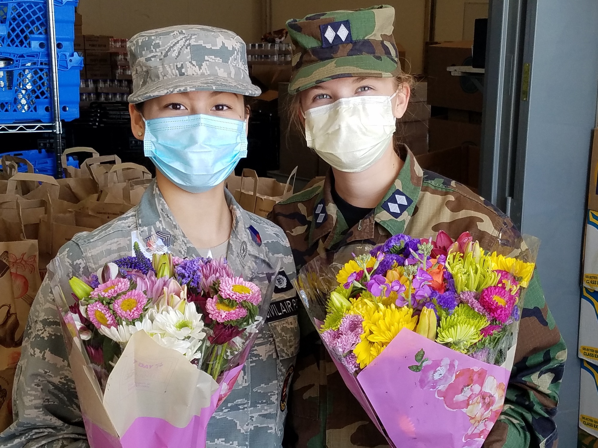 Food Pantry Staff presented bouquets of flowers to the cadets for their hard work Photo credit: Lt Col Gary Gross, Col Shorty Powers Composite Squadron